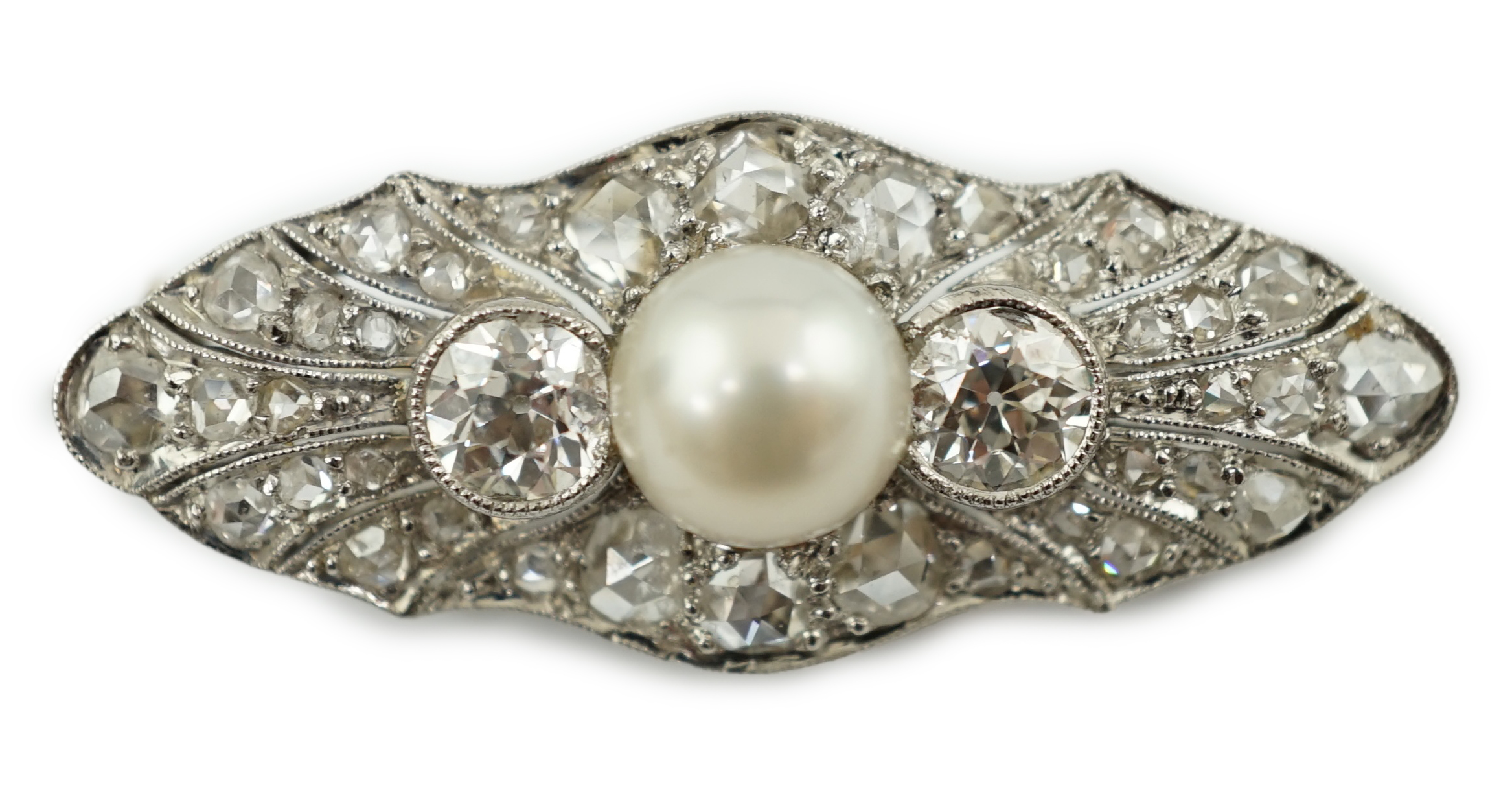 A Belle Epoque white gold, single stone split pearl and millegrain set diamond cluster lozenge shaped brooch